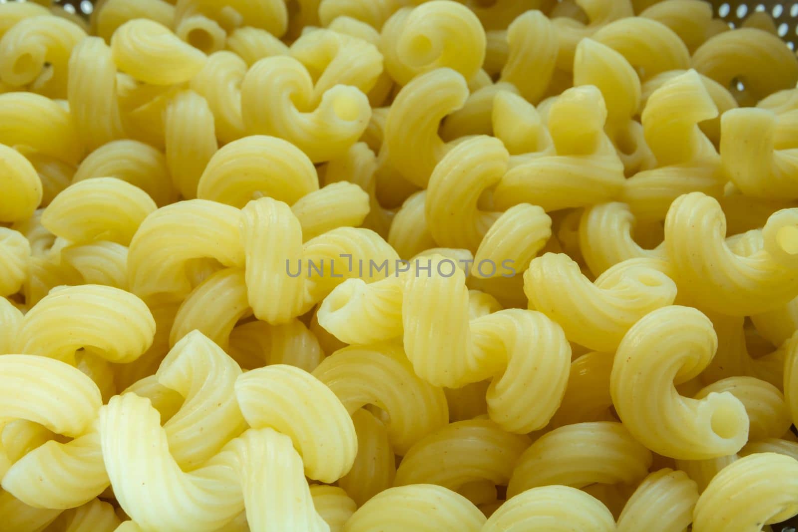 Close up of yellow gimlet pasta, top view