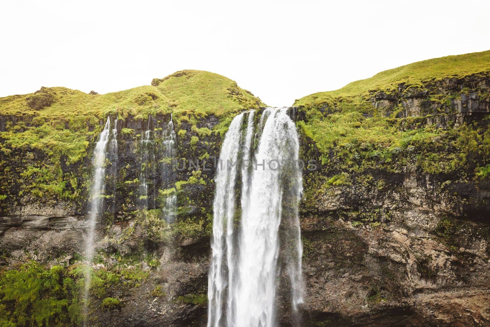 Gljufrafoss, or Gljufrabui, waterfall, a small waterfall hidden on a narrow canyon near the more famous Seljalandsfoss, southern Iceland. High quality photo.