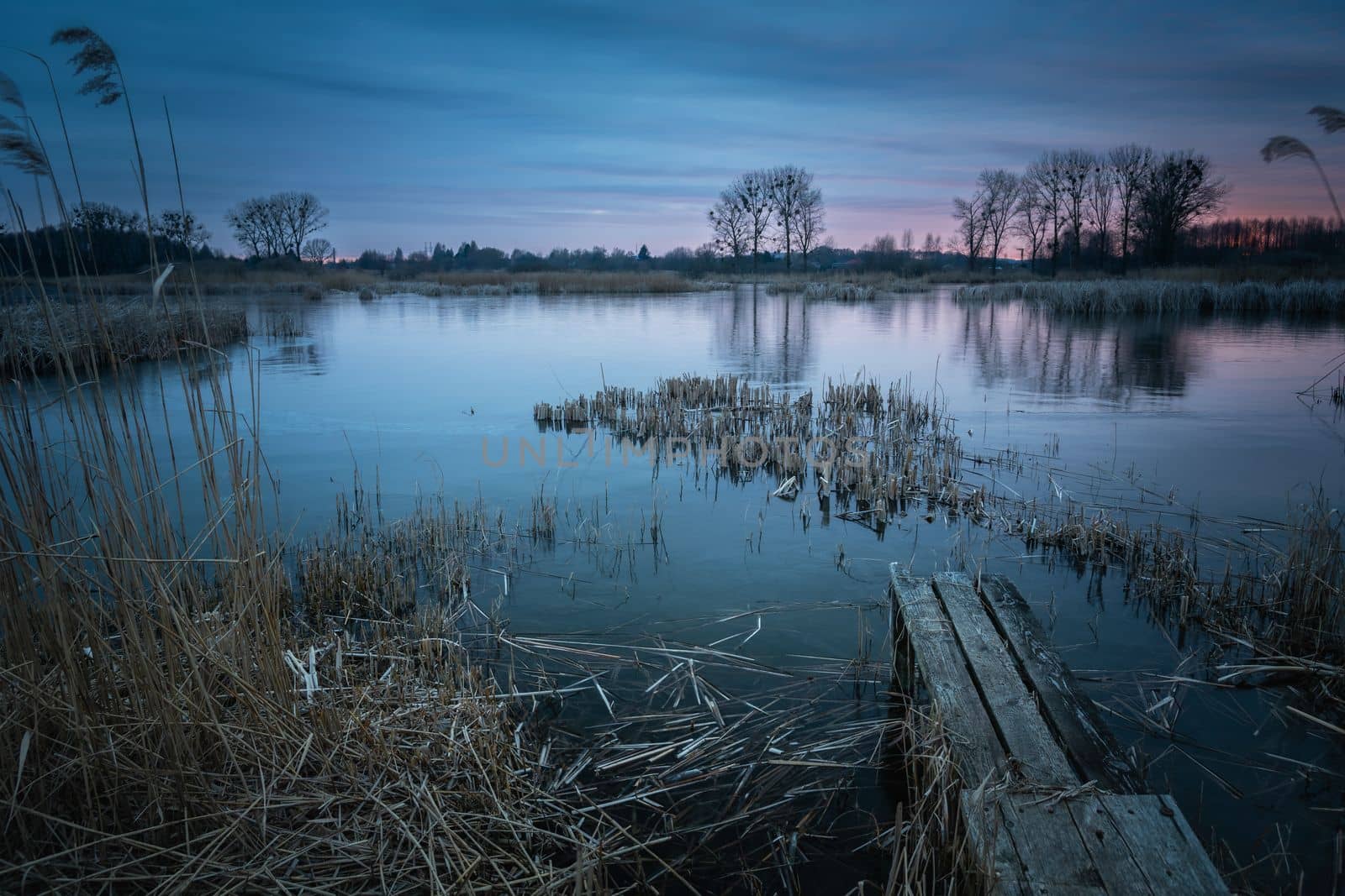 March view of the lake after sunset, Stankow, Poland