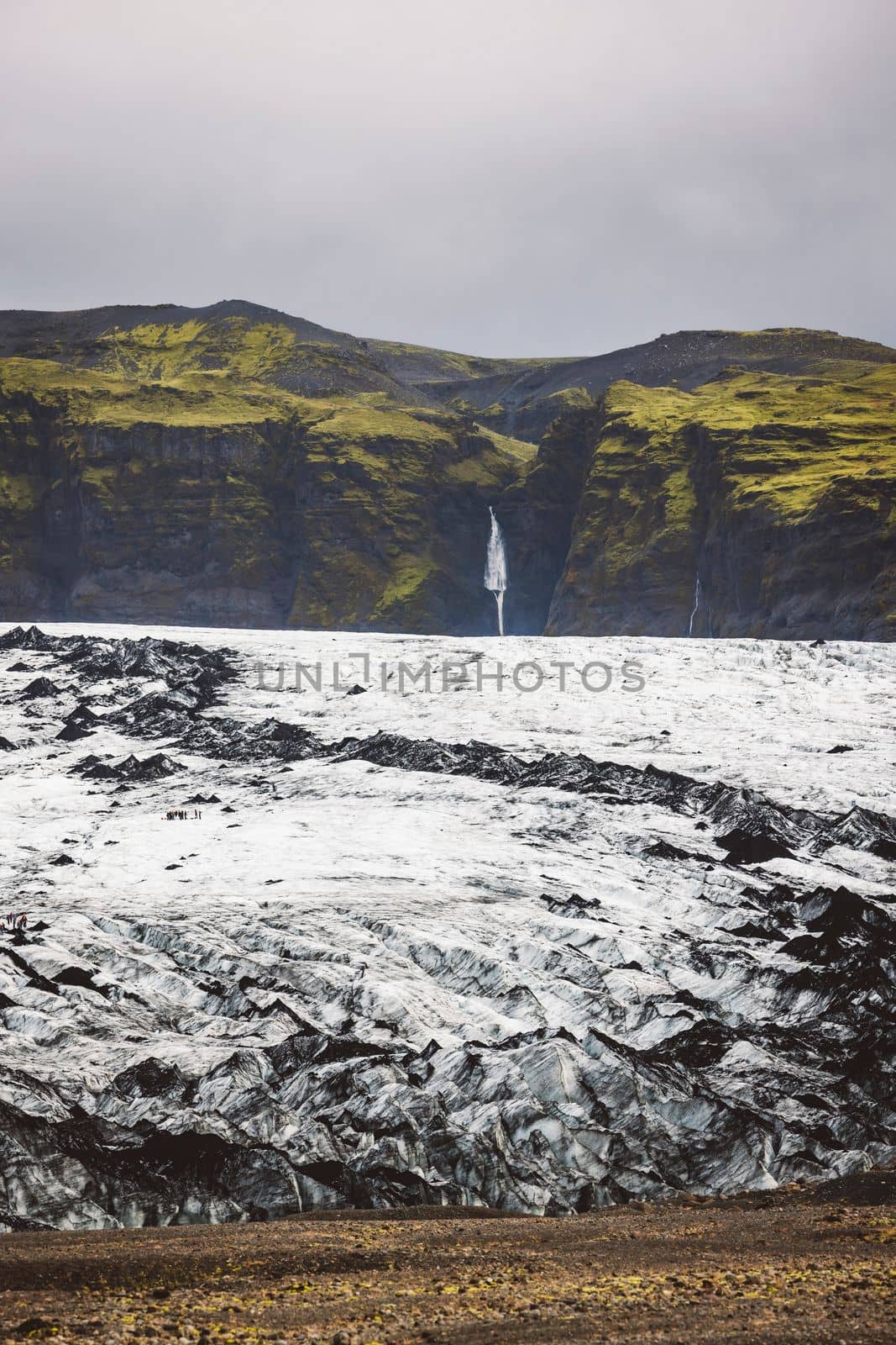 Fantastic view on Solheimajokull glacier in Katla Geopark on Icelandic Atlantic South Coast. Location: South glacial tongue of Myrdalsjokull ice cap, near Vik village, Iceland, Europe. High quality photo
