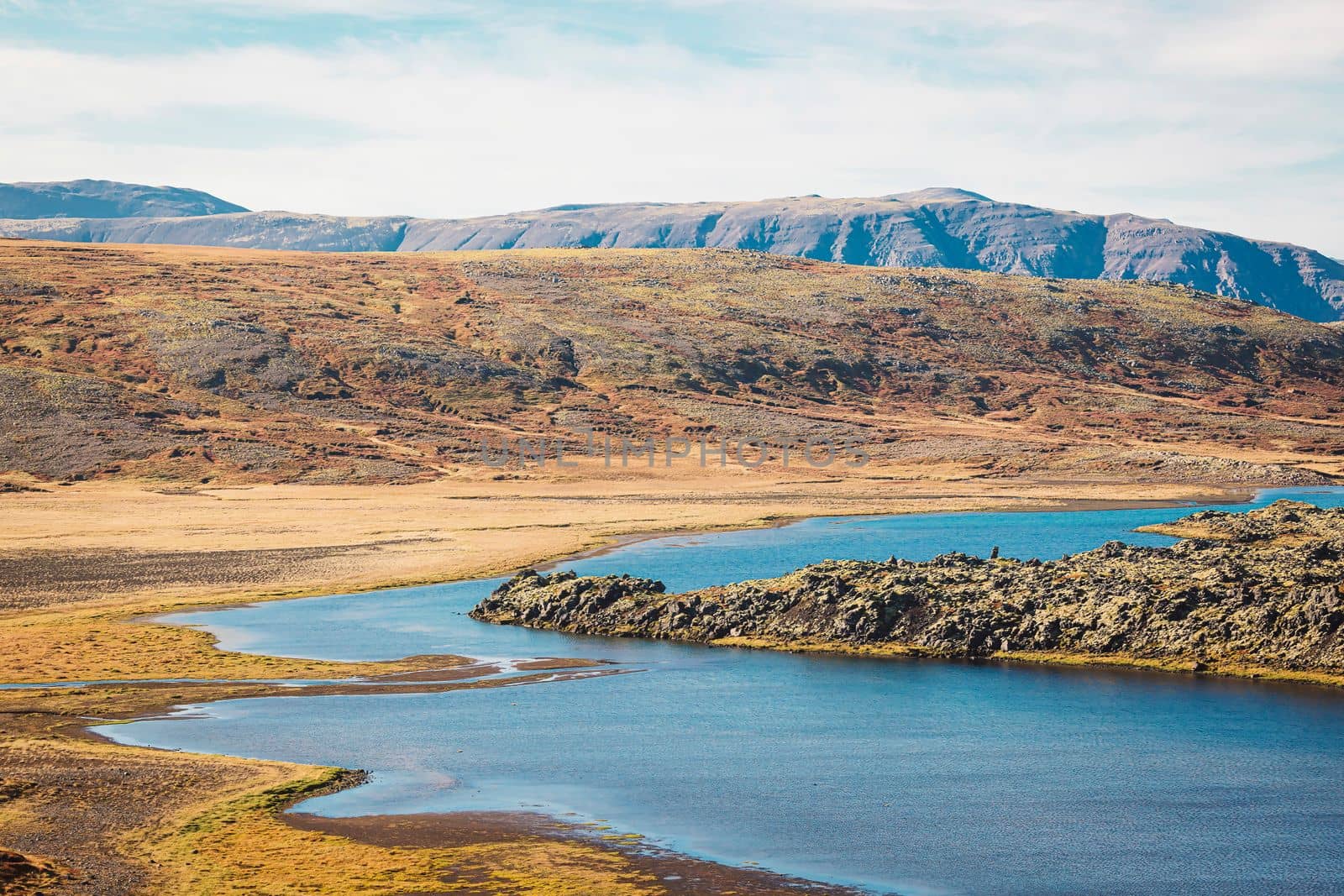 Selvallavatn lake in the Snaefellsnes peninsula in western Iceland, beautiful coney mountains in the background. High quality photo