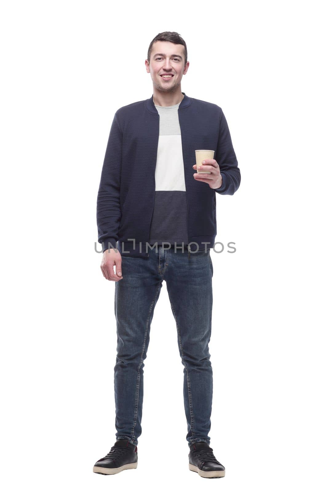 smiling guy with a takeaway coffee . isolated on a white background.