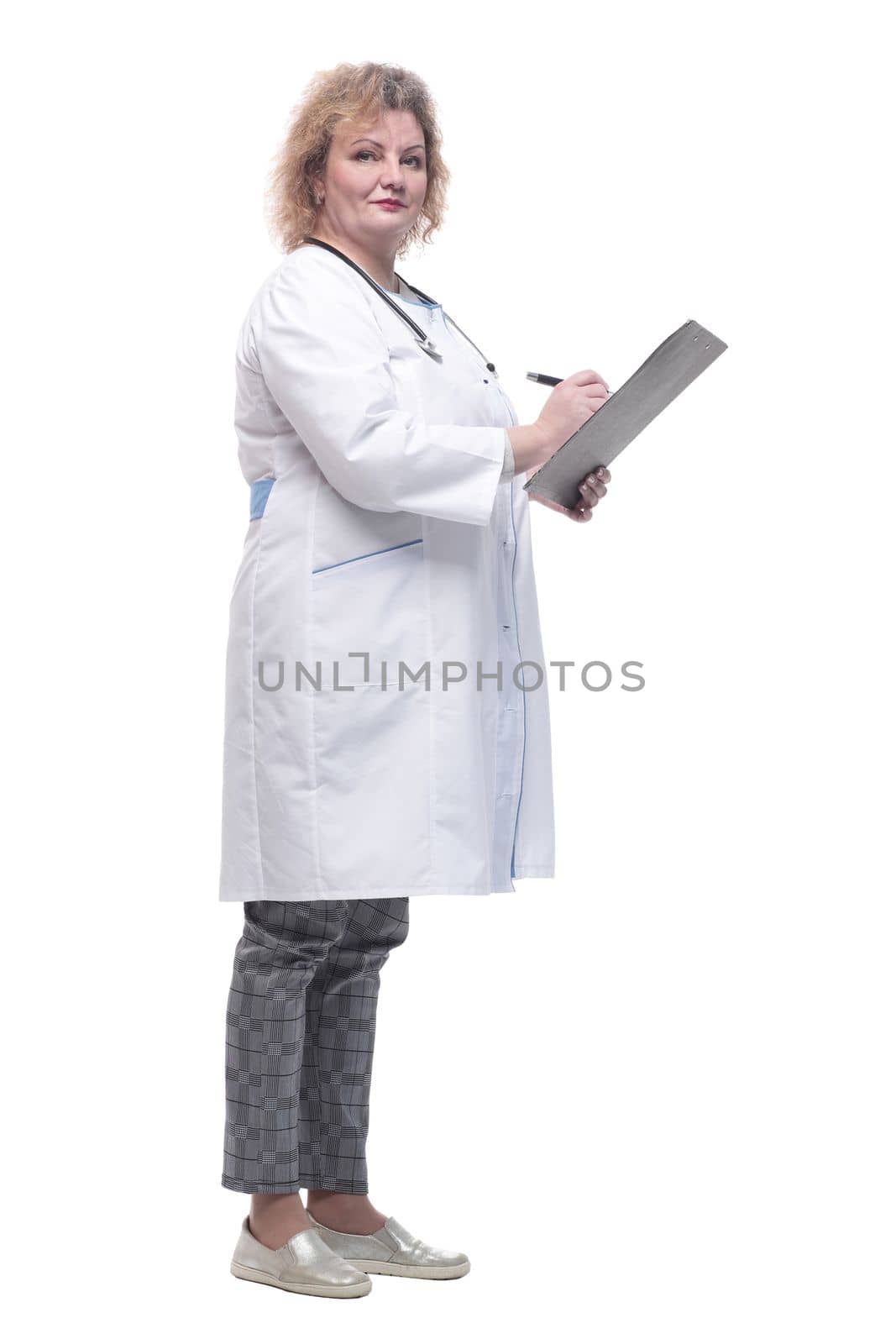 full-length. senior female doctor with clipboard. isolated on a white background.