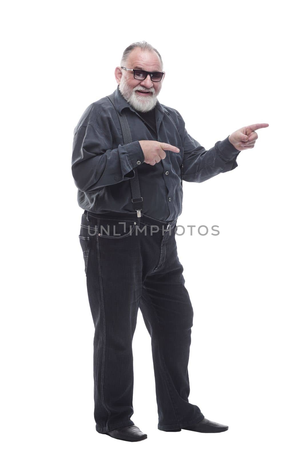 in full growth. confident older man pointing at you. isolated on a white background.