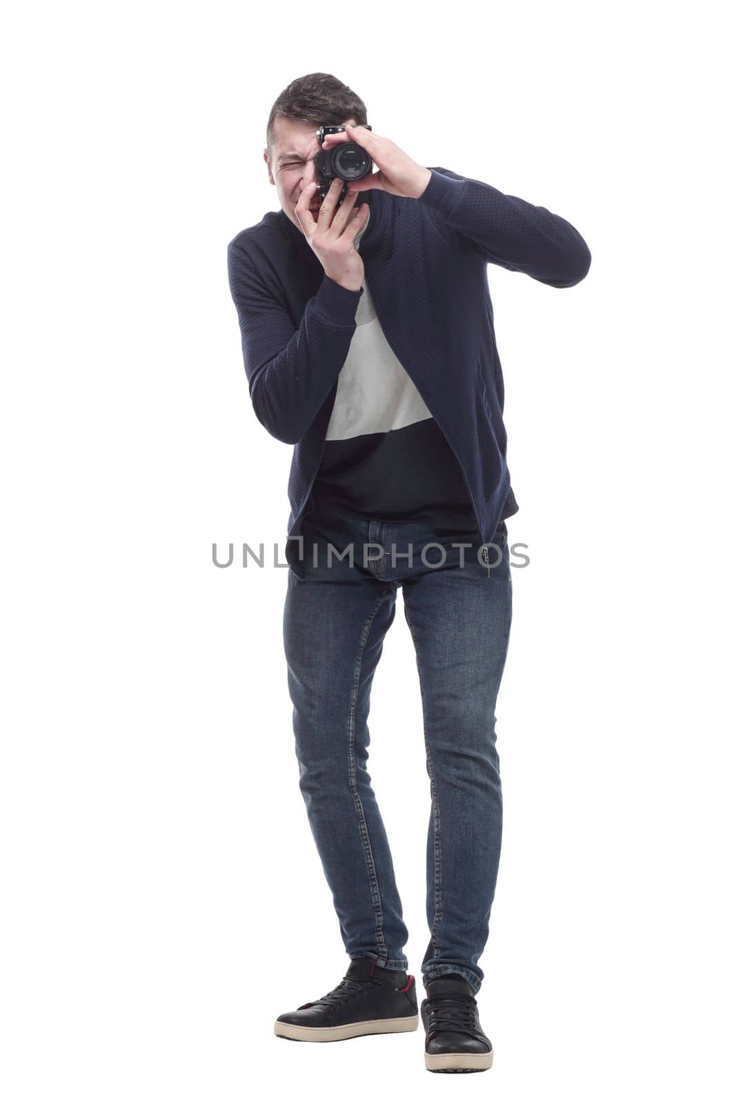 young man with a camera. isolated on a white background.