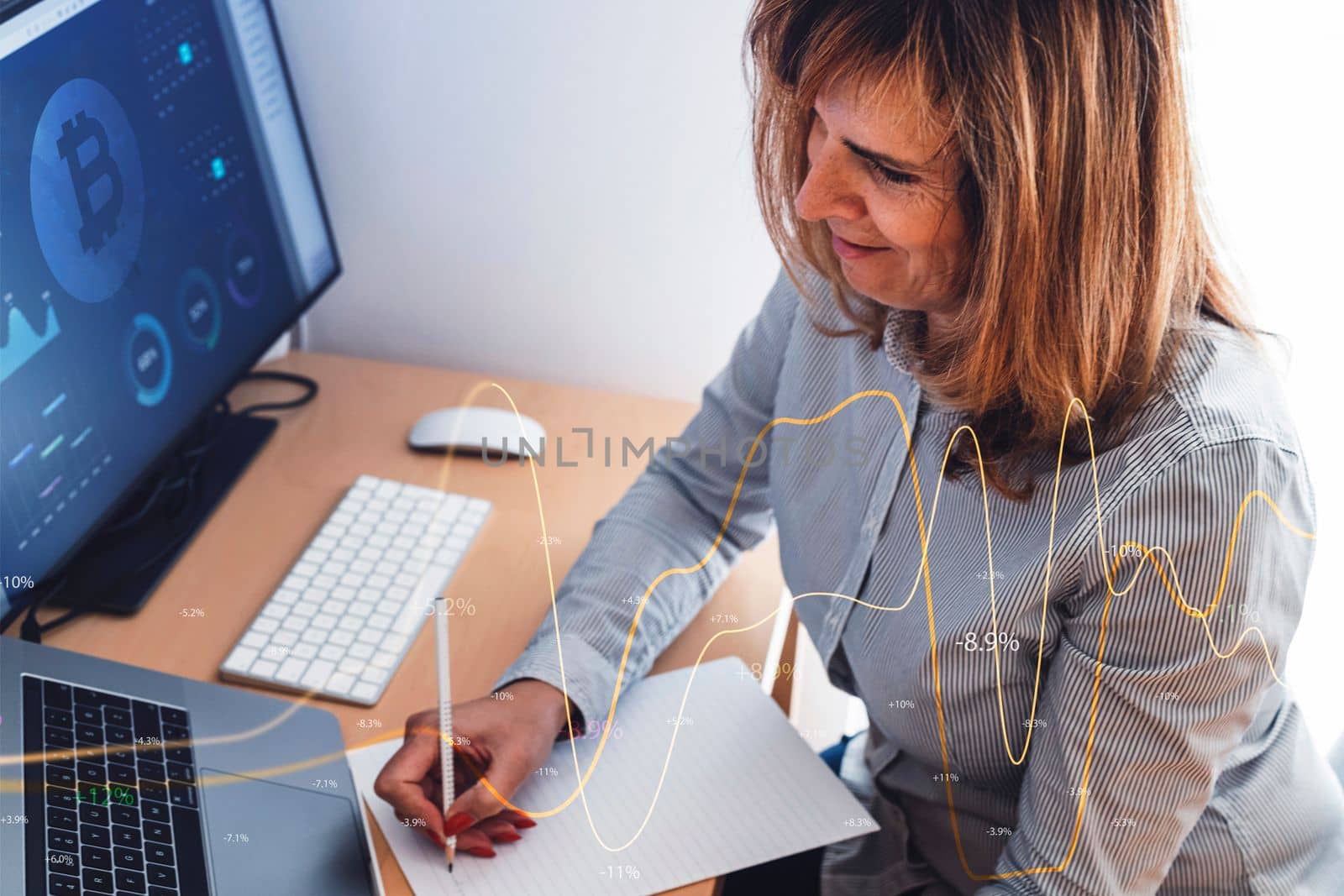 Professional businesswoman working at her office via laptop, young female manager using computer device while sitting at modern loft, computer graphics, work process concept. High quality photo