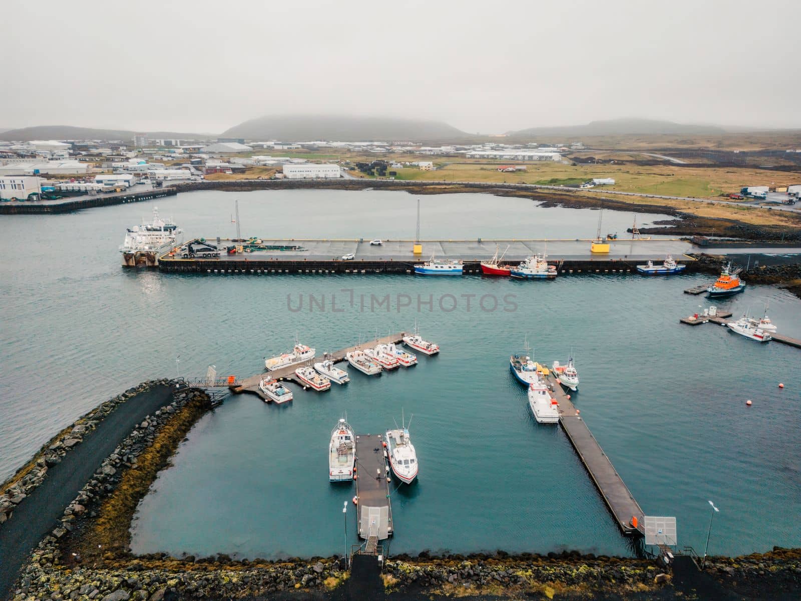 Grindavik fishing town by the sea in Iceland. Harbor by the sea. Cold autumn day in Iceland High quality photo