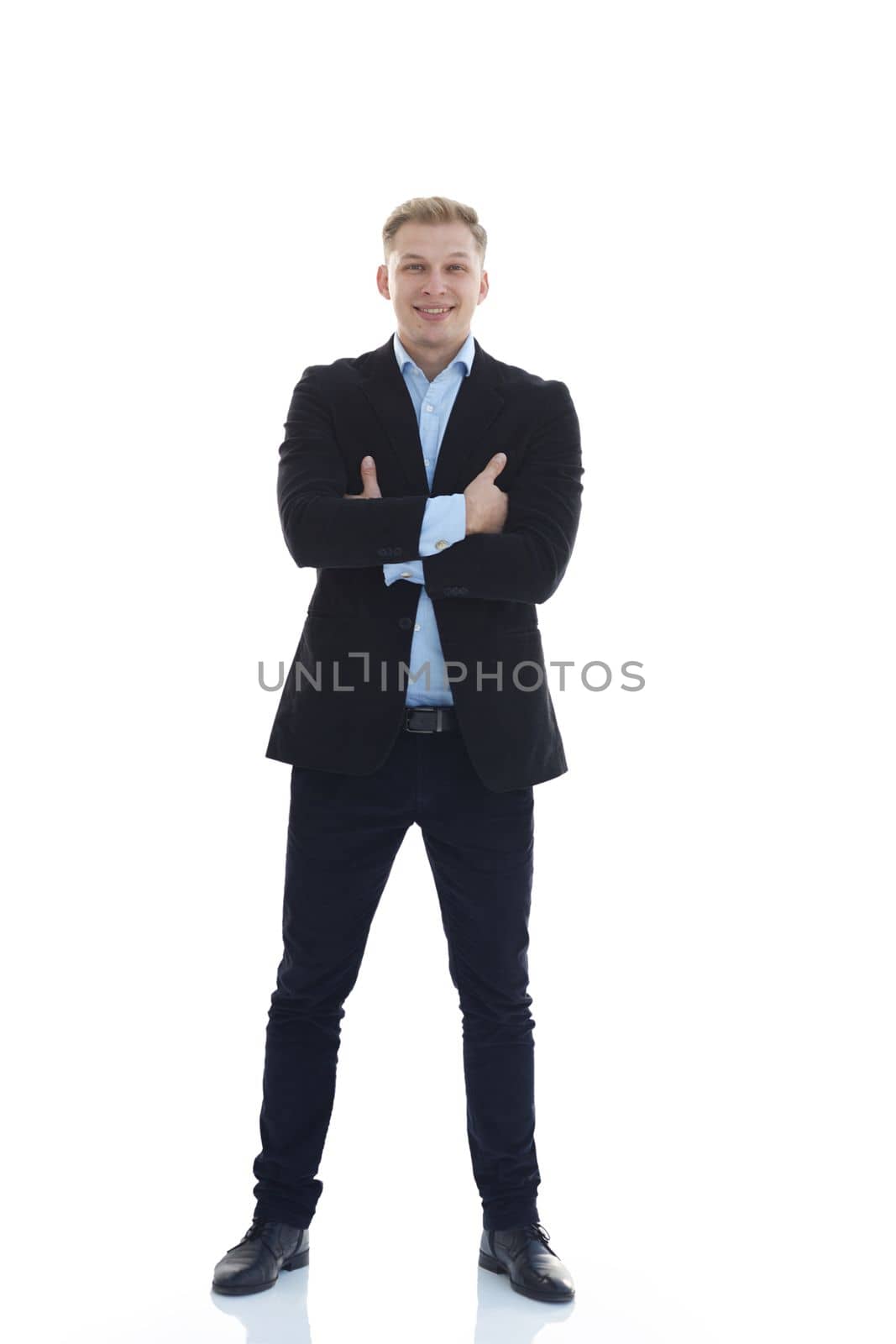 in full growth.a young man in a stylish business suit. isolated on a white background.