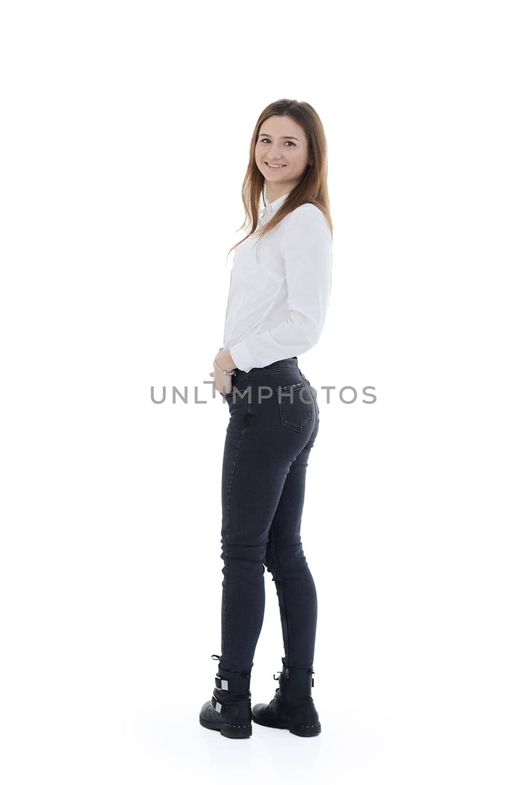 side view. smiling attractive girl looking at you . isolated on a white background.