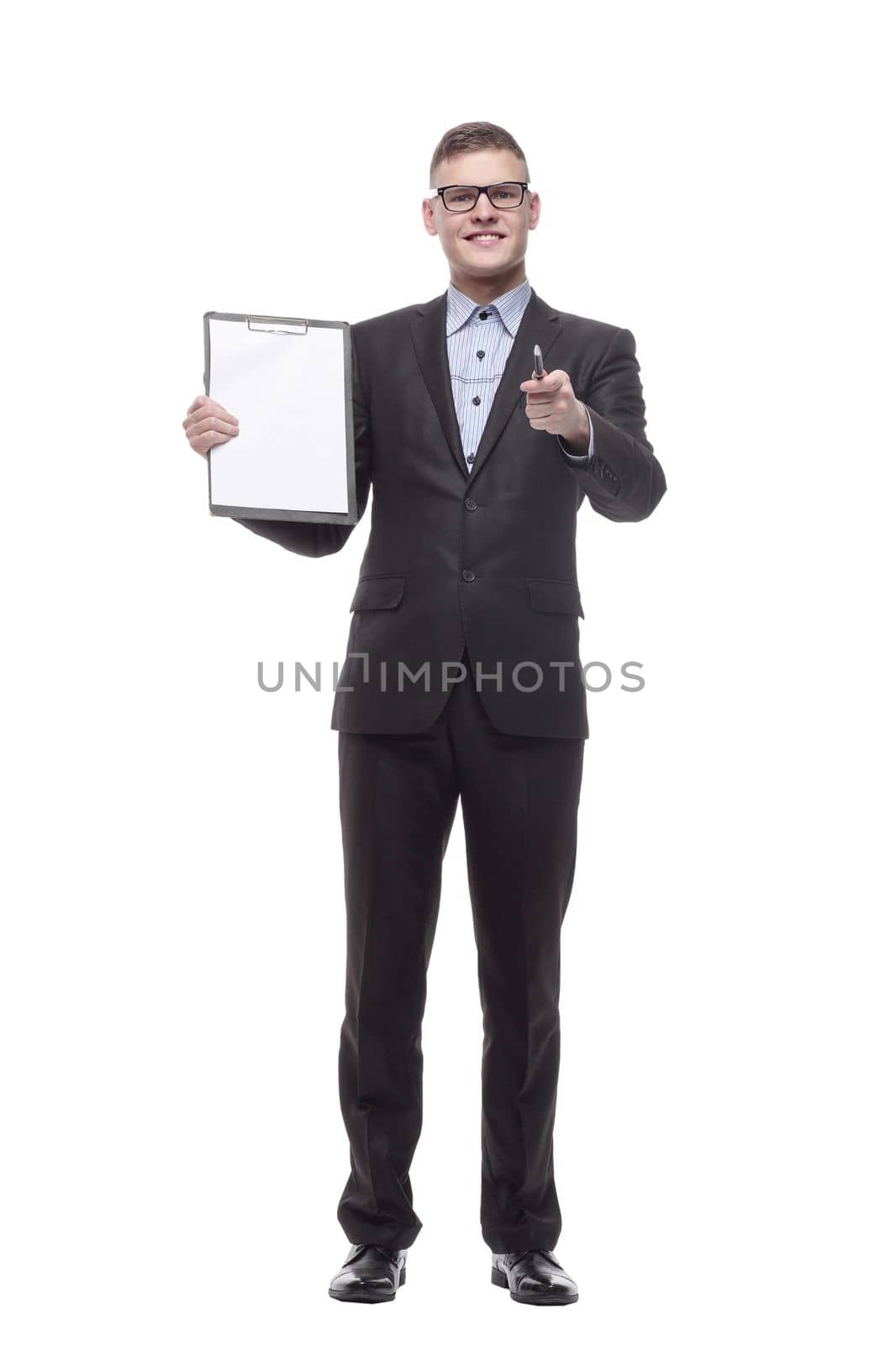 in full growth. smiling business man with clipboard . isolated on a white background.