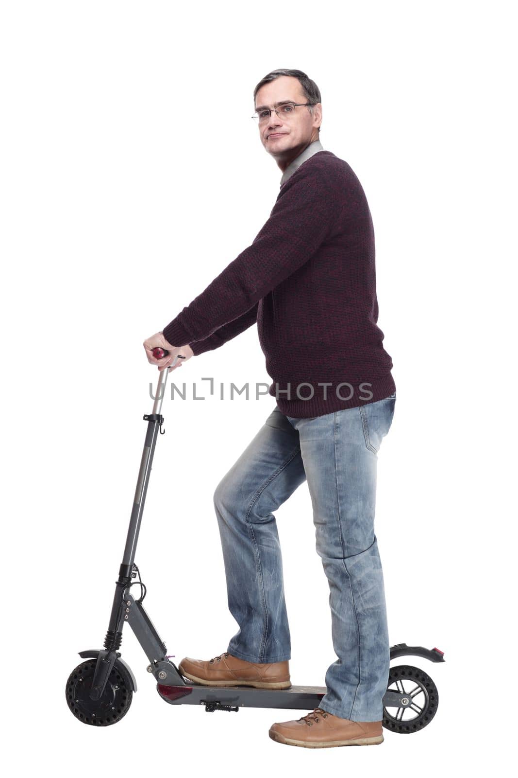 casual man with electric scooter. isolated on a white background.