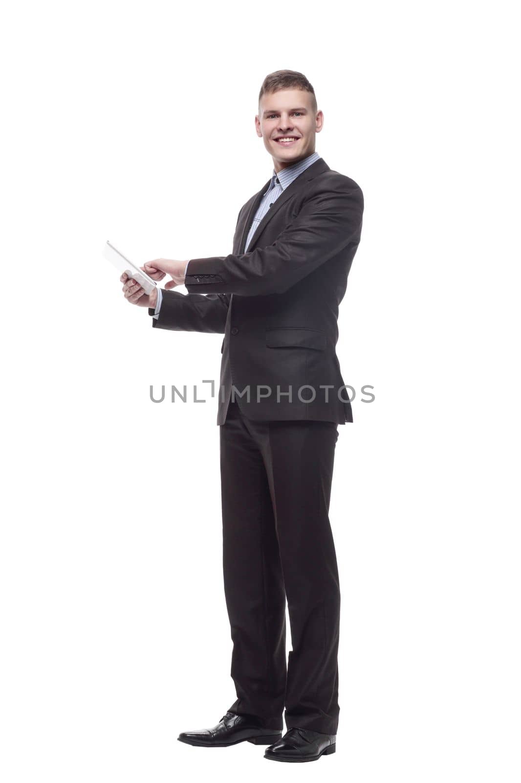 happy young businessman with a digital tablet . by asdf