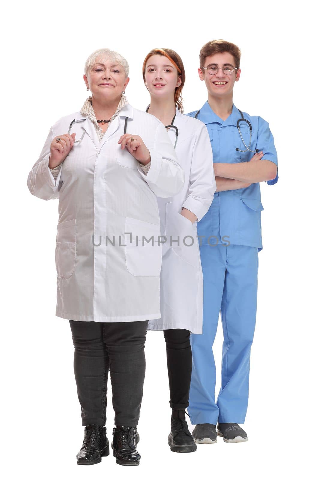 Group of successful doctors standing together isolated over white background by asdf