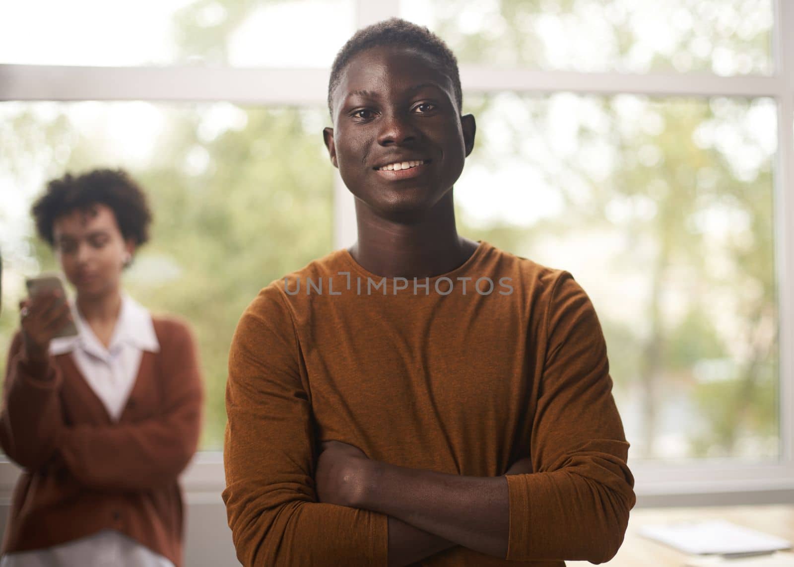 Portrait of a young African American business man in office by asdf