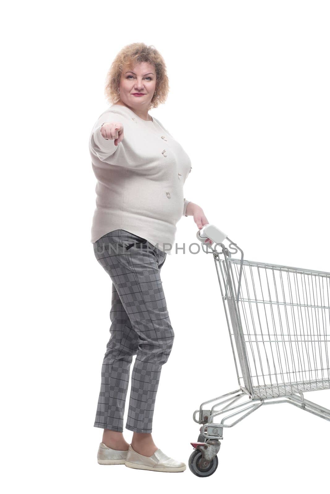 full-length. casual adult woman with shopping cart. isolated on a white background.