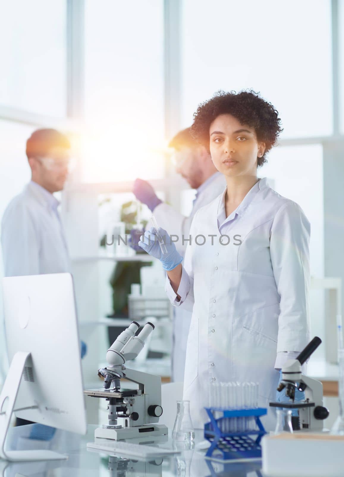 Scientists smiling together in lab