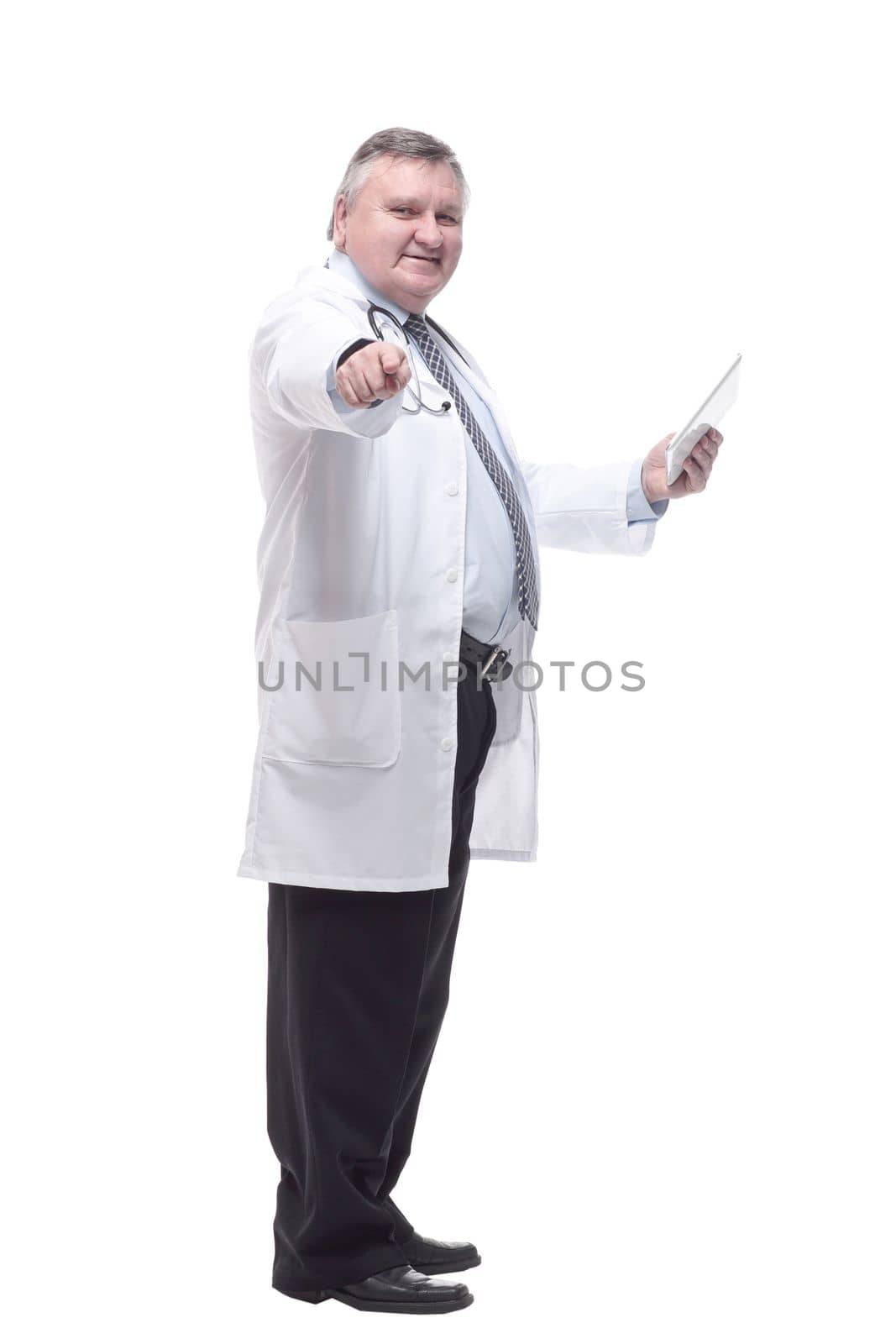 competent doctor with a digital tablet. isolated on a white background. by asdf