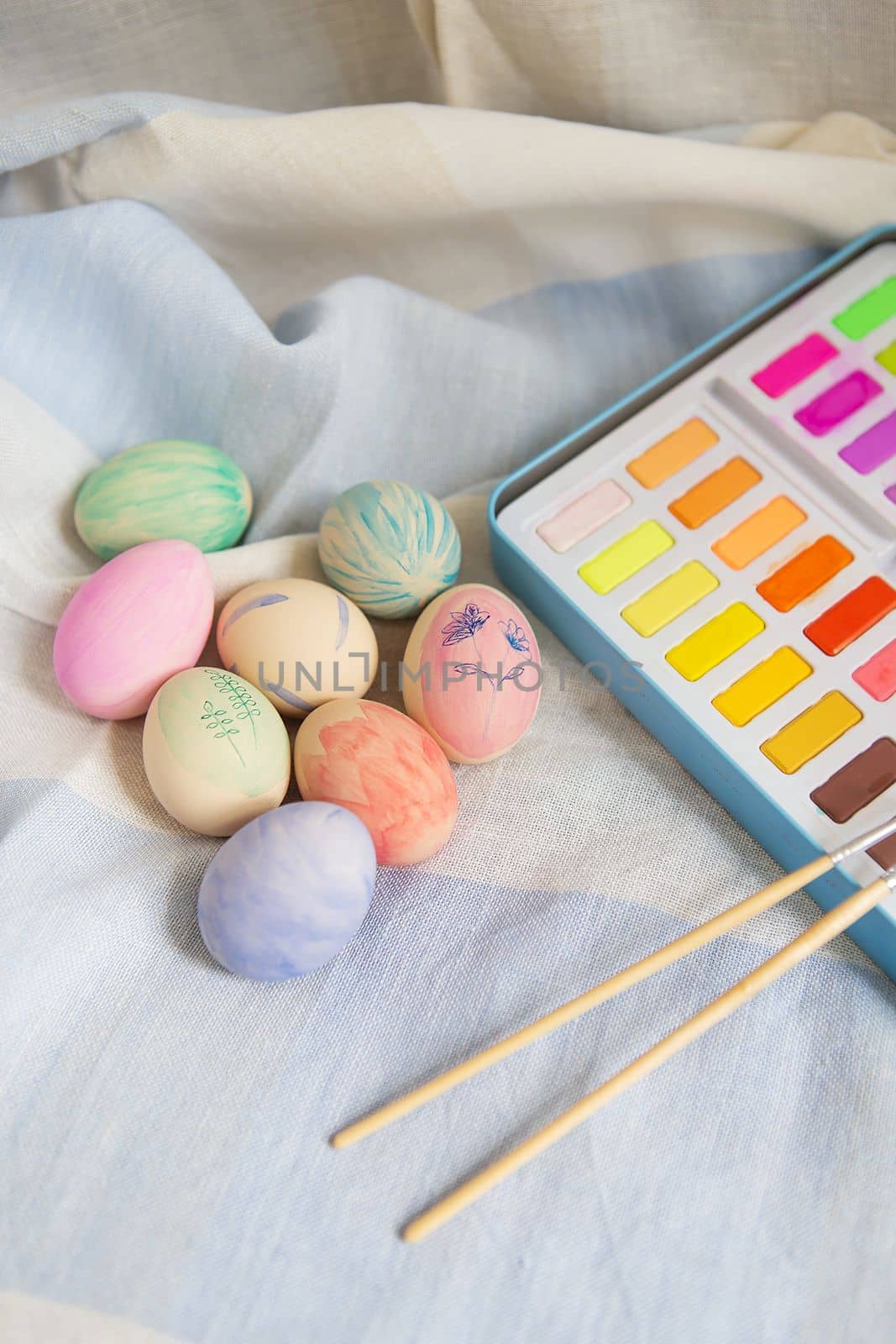 Easter, festive mood. Painted multi-colored Easter eggs which are painted with watercolor paint, hand-painted. by sfinks