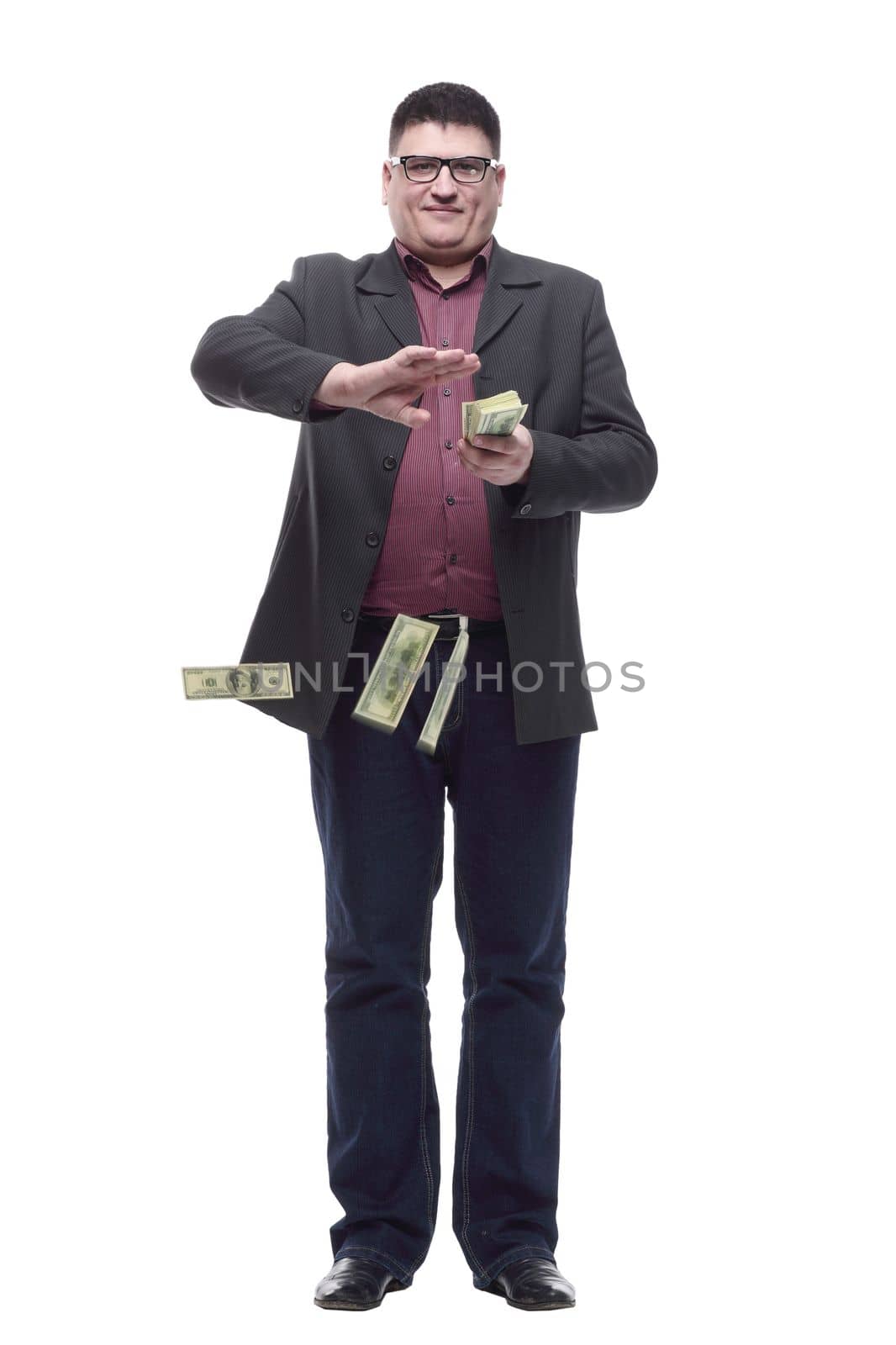 Mature business man with a bundle of banknotes. isolated on a white background.