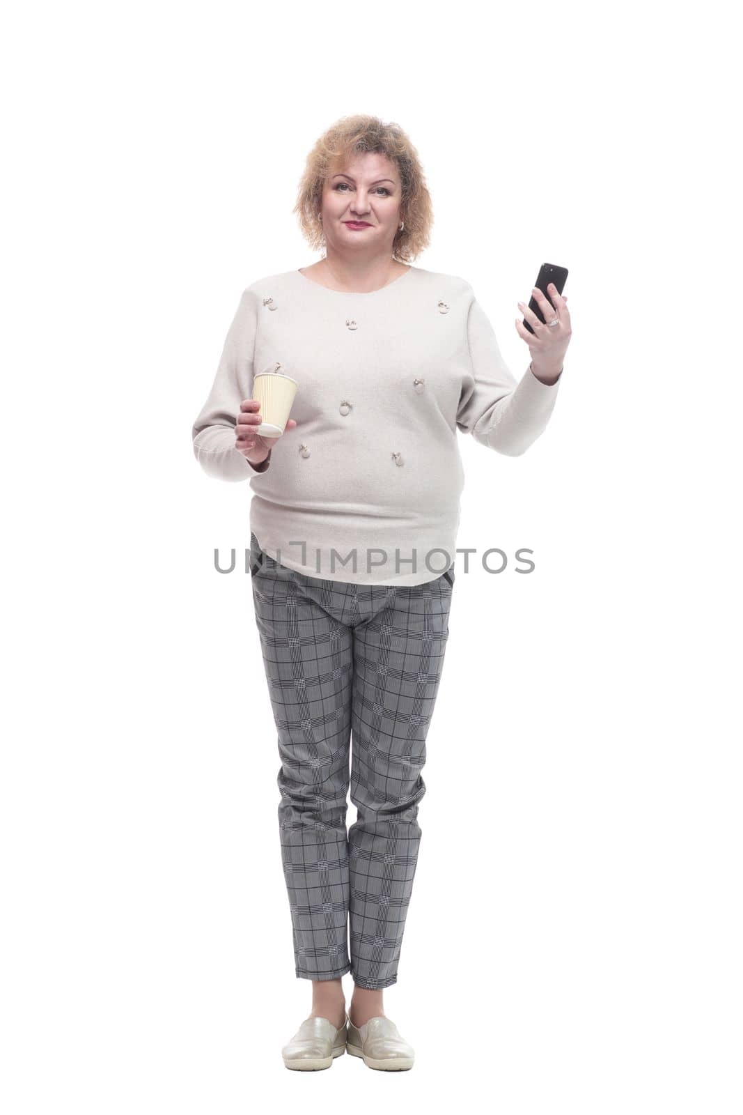 casual adult woman with smartphone and takeaway coffee. by asdf