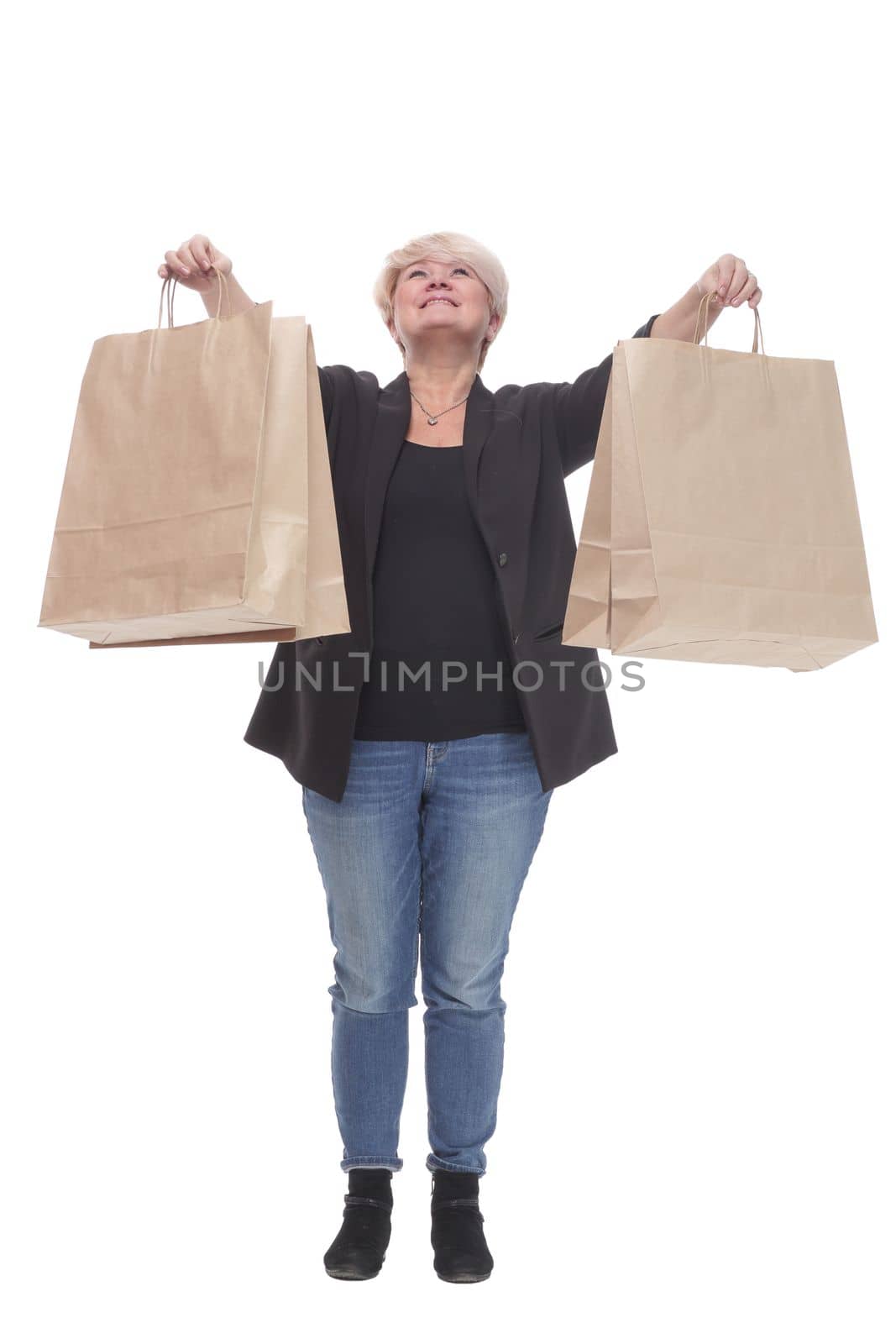 full-length. casual mature woman with shopping bags . by asdf