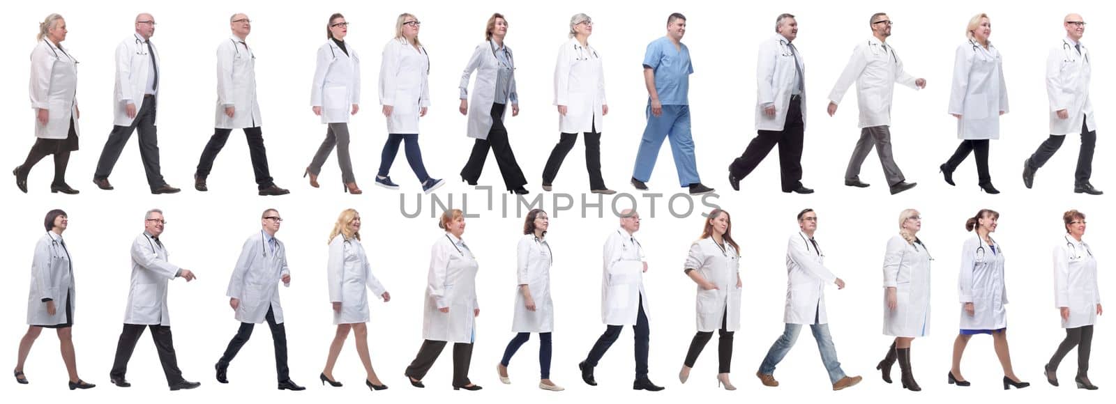 group of doctors in motion isolated on white background