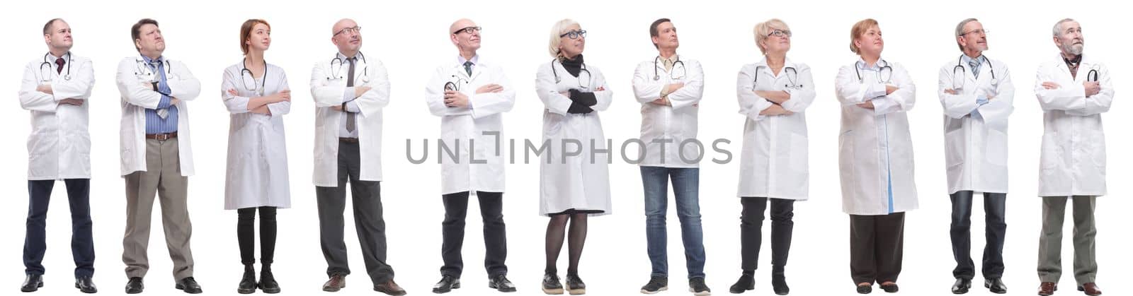 group of doctors standing in full length isolated on white background