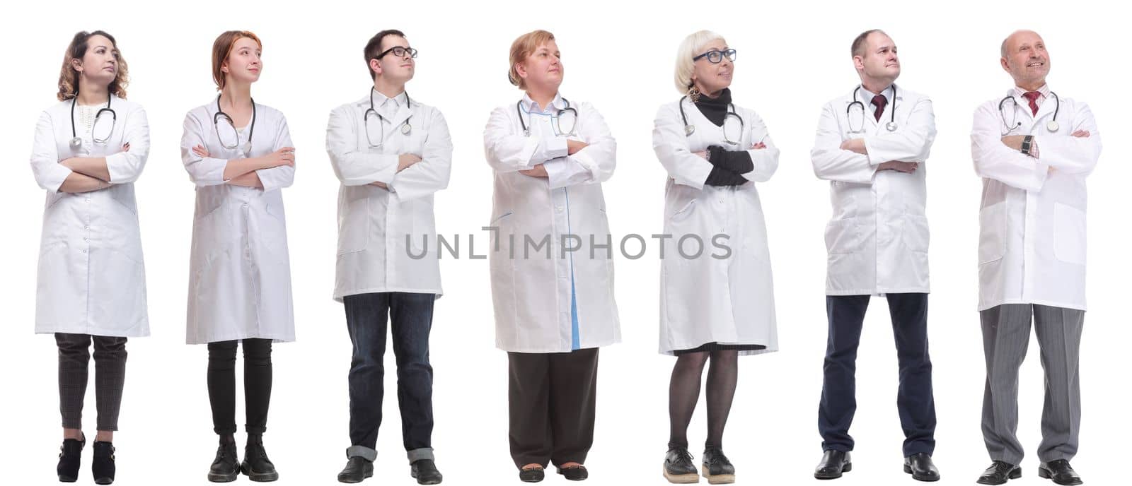 group of doctors standing in full length isolated on white background