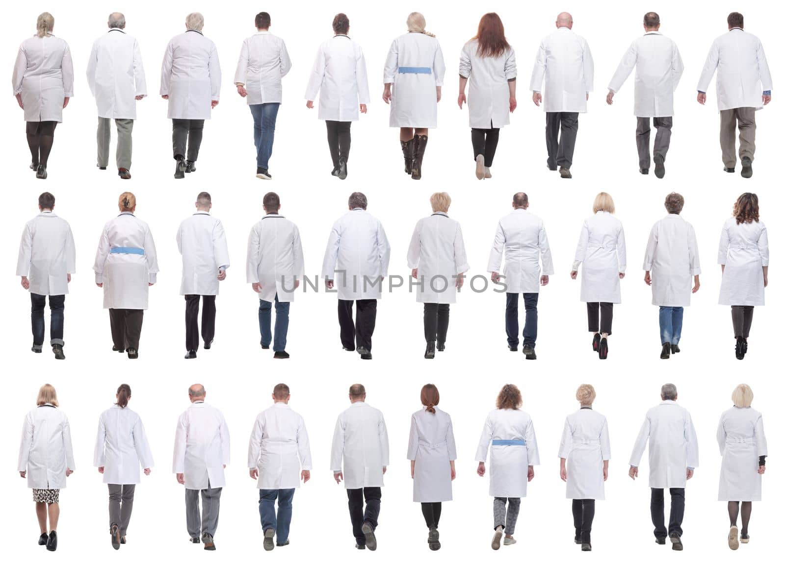 group of doctors in motion isolated on white background