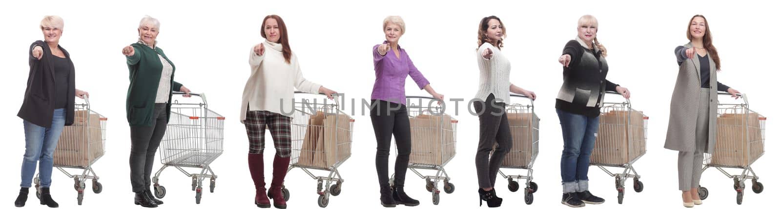 group of people with cart pointing finger at camera isolated on white background