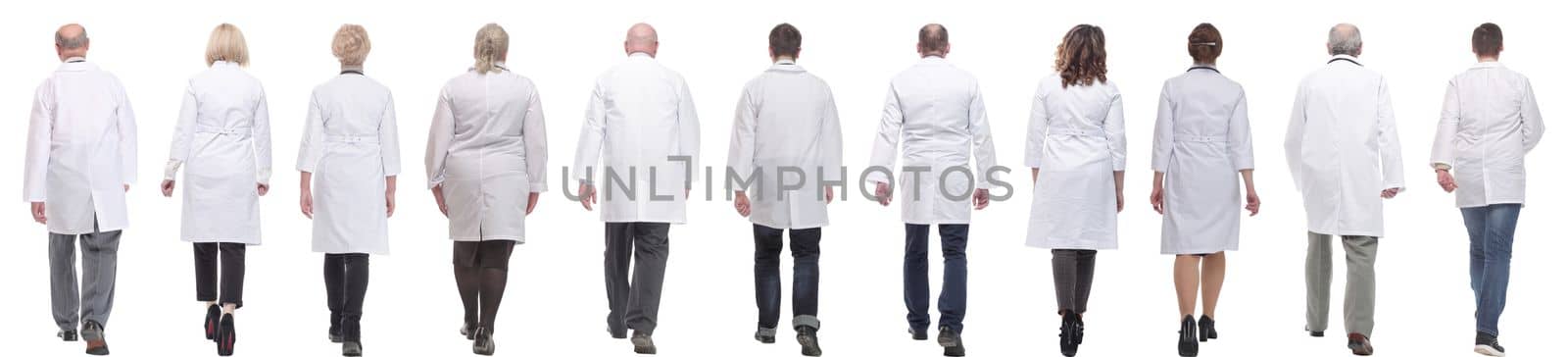 group of doctors in motion isolated on white background