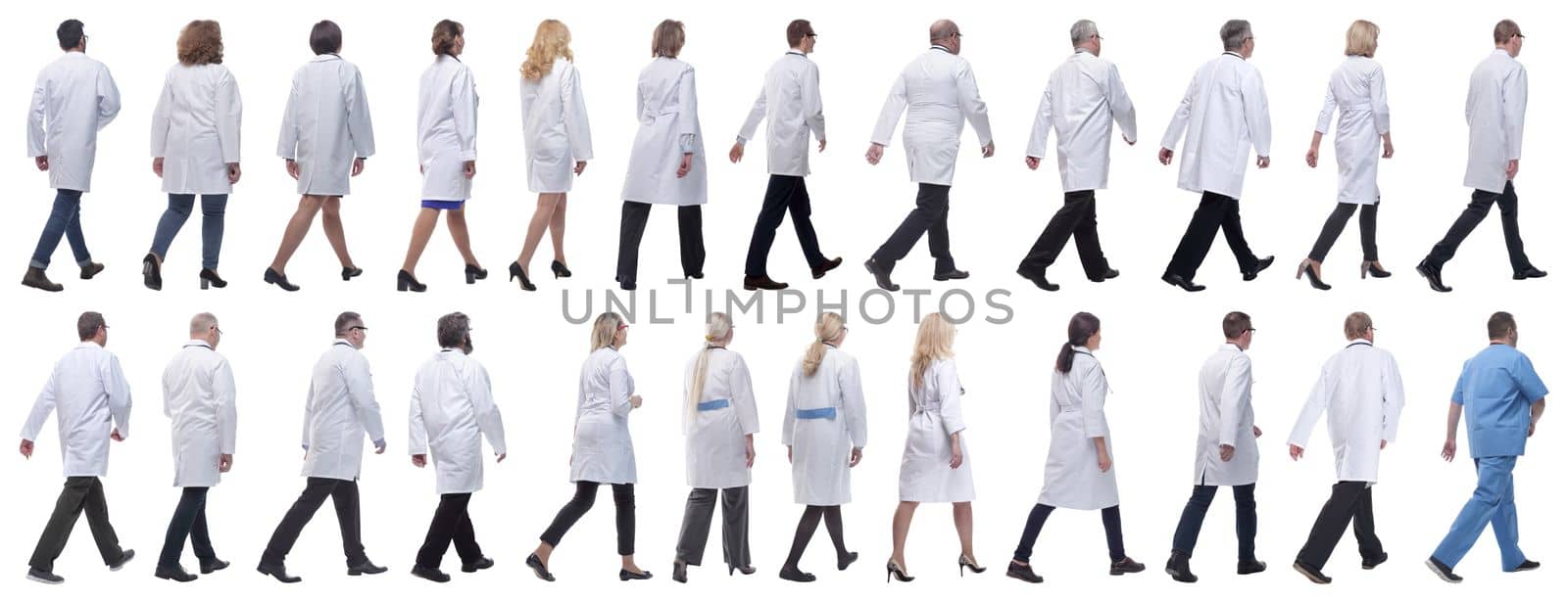 group of doctors in motion isolated on white background