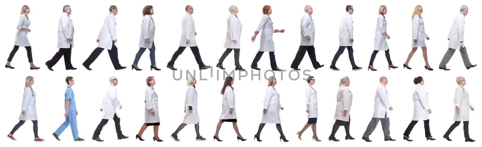 group of doctors in motion isolated on white background
