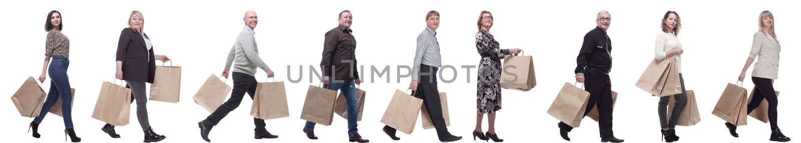 a line of people with shopping bags. side view by asdf