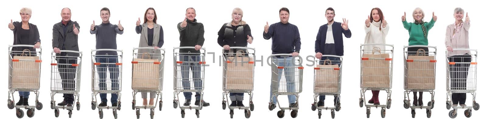 group of people with shopping cart showing thumbs up isolated on white background