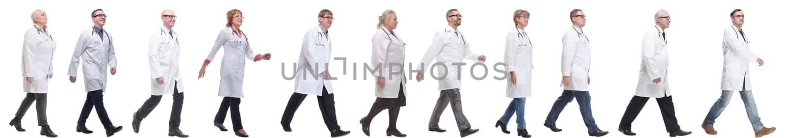 group of doctors in motion isolated on white background