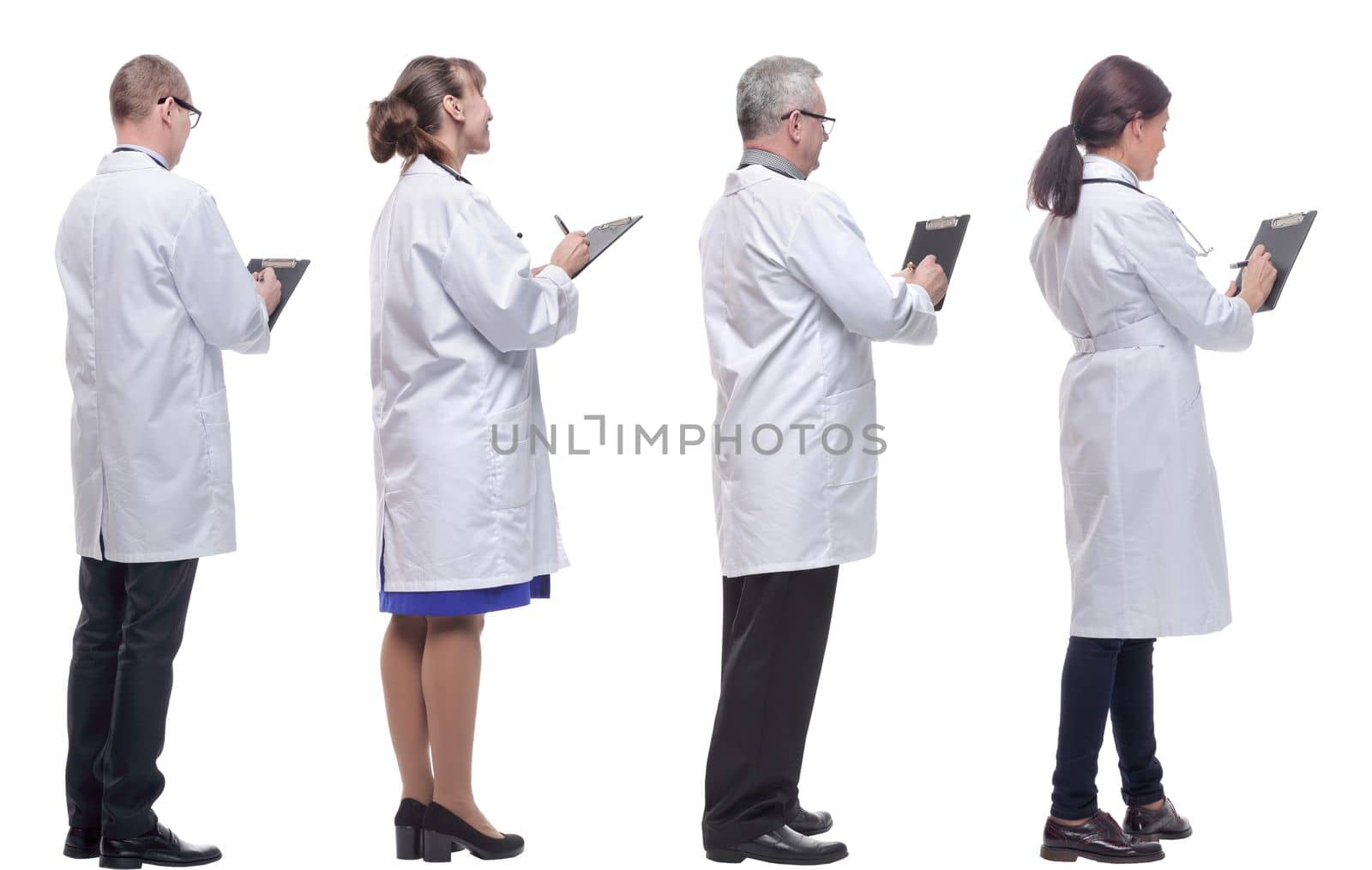 group of doctors standing with their backs isolated on white by asdf