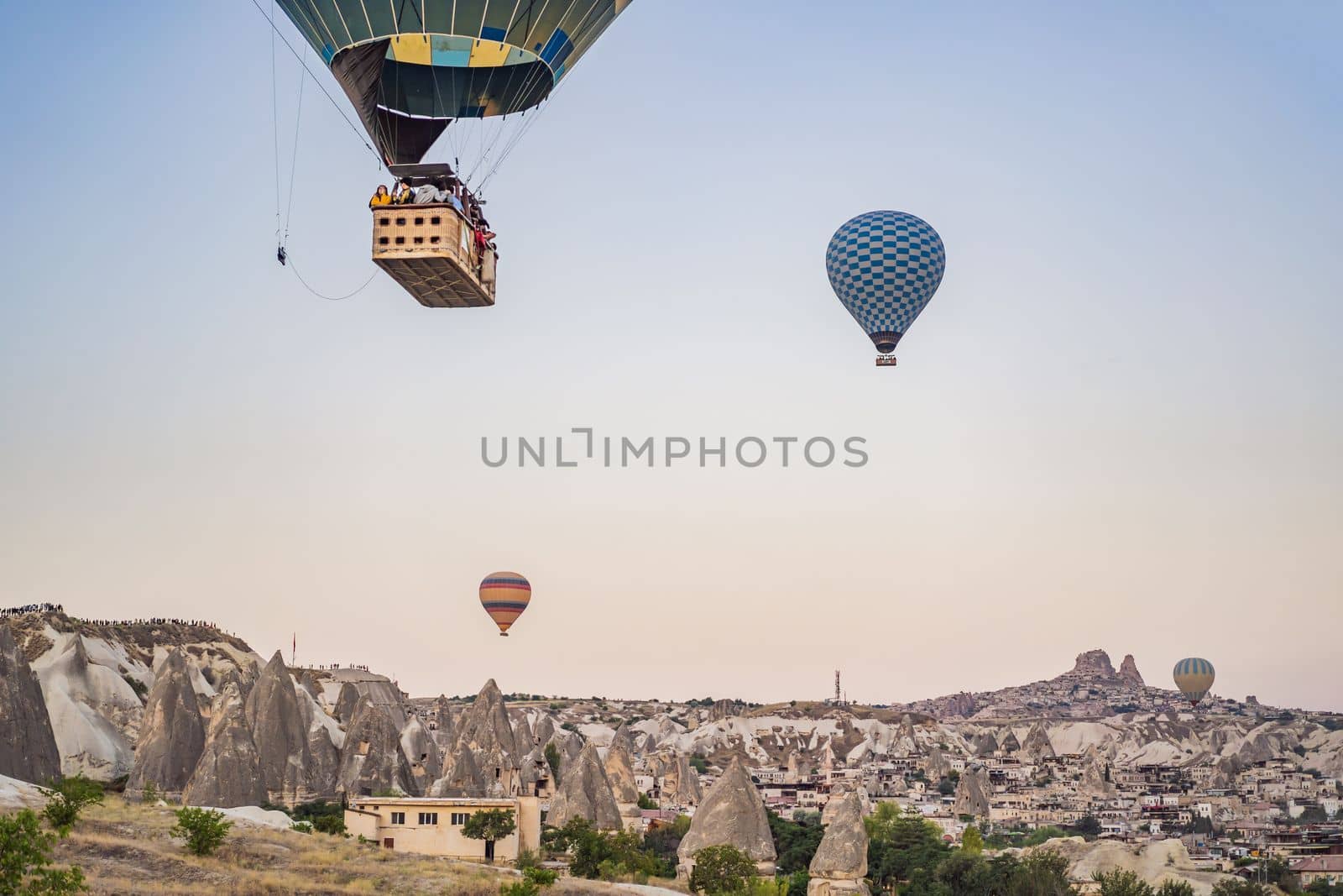 Colorful hot air balloon flying over Cappadocia, Turkey by galitskaya