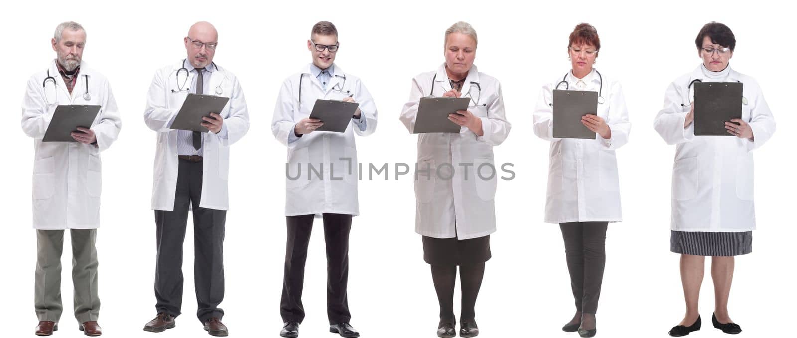 full length group of doctors with notepad isolated on white background