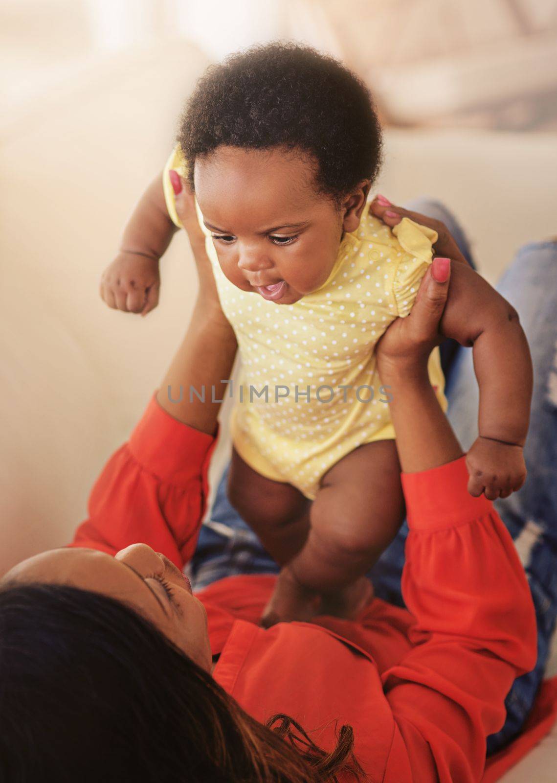 Shes a little bit of heaven. a mother holding her baby girl