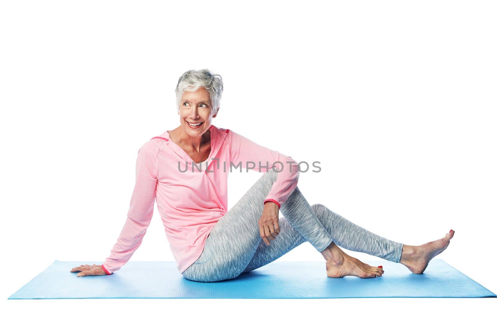 Yoga, fitness and senior woman in studio isolated on a white background. Zen chakra, pilates and retired, elderly and happy female model sitting on mat, thinking and training for health and wellness. by YuriArcurs