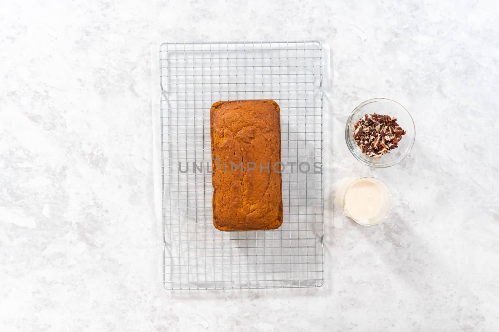 Flat lay. Colling freshly baked pumpkin bread on a kitchen cooling rack.