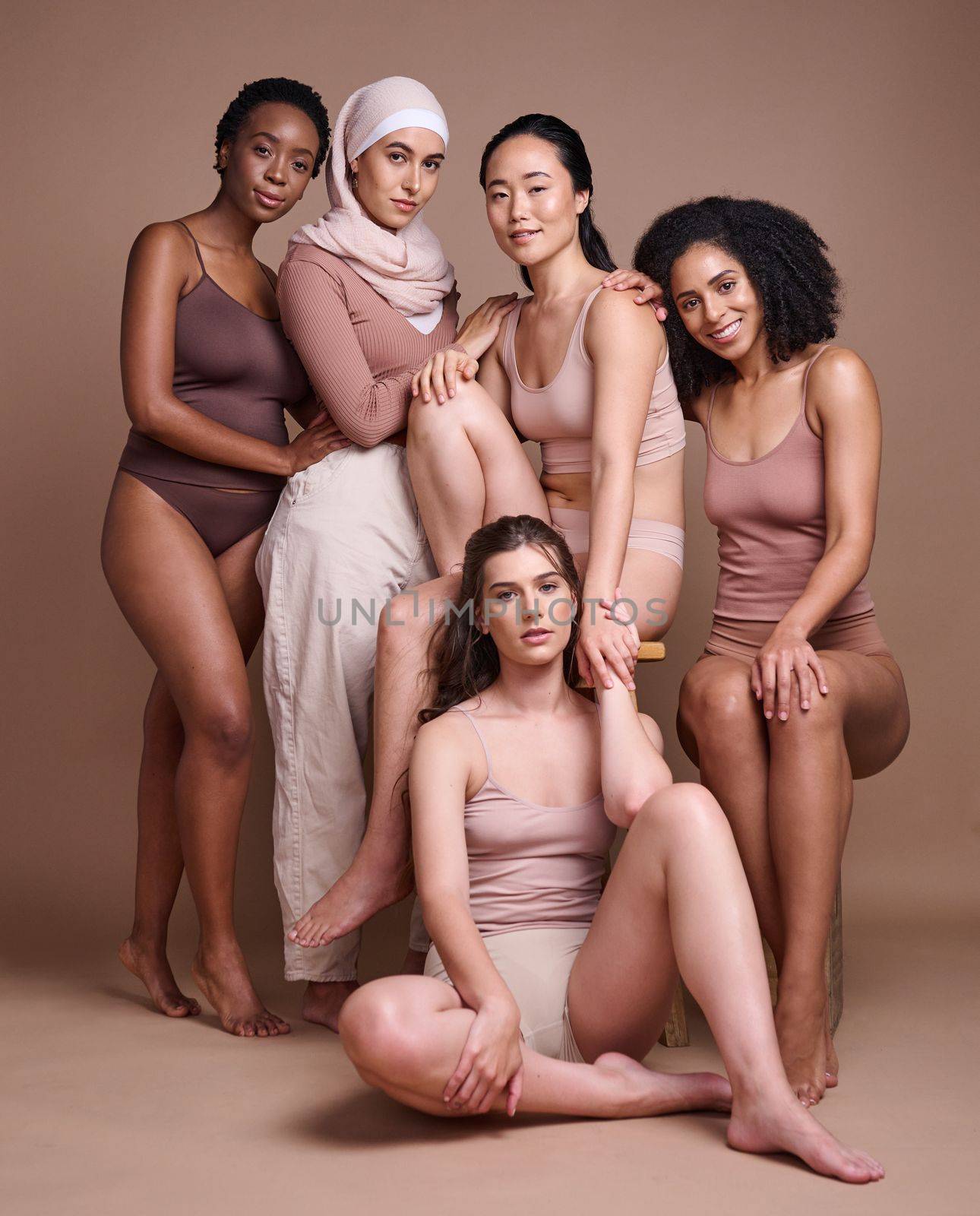 Women diversity, beauty and body while together for inclusion, skincare and different skin color portrait on studio for cosmetic and dermatology. Aesthetic model group with pride for body and culture.