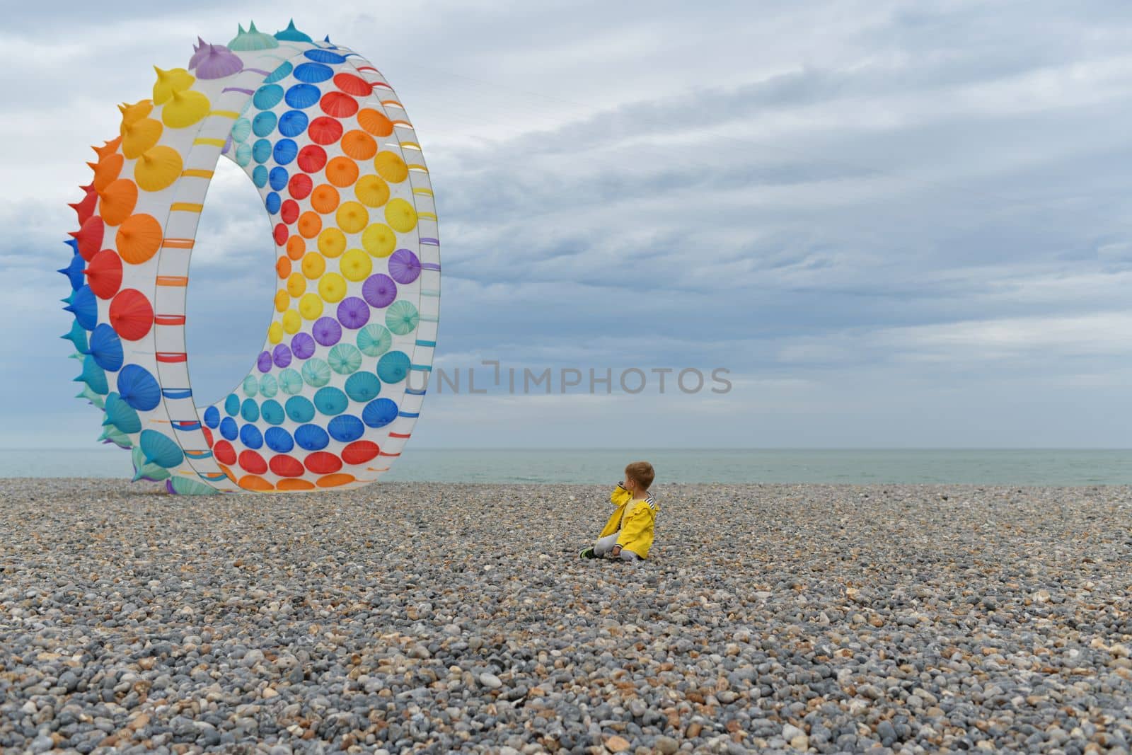 Multicolored air kite at the Atlantic ocean