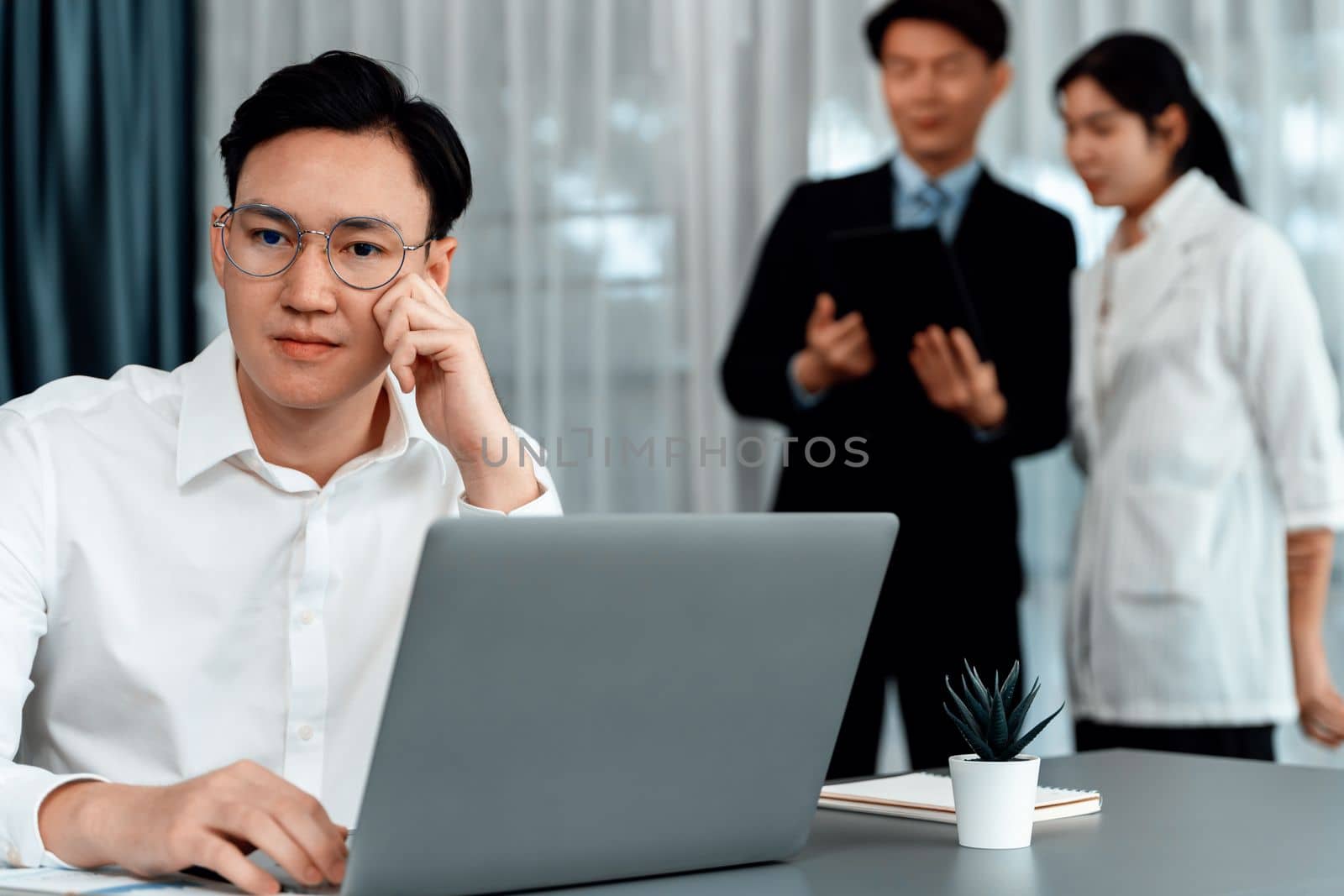 Portrait of focus successful confident male manager in harmony office. by biancoblue