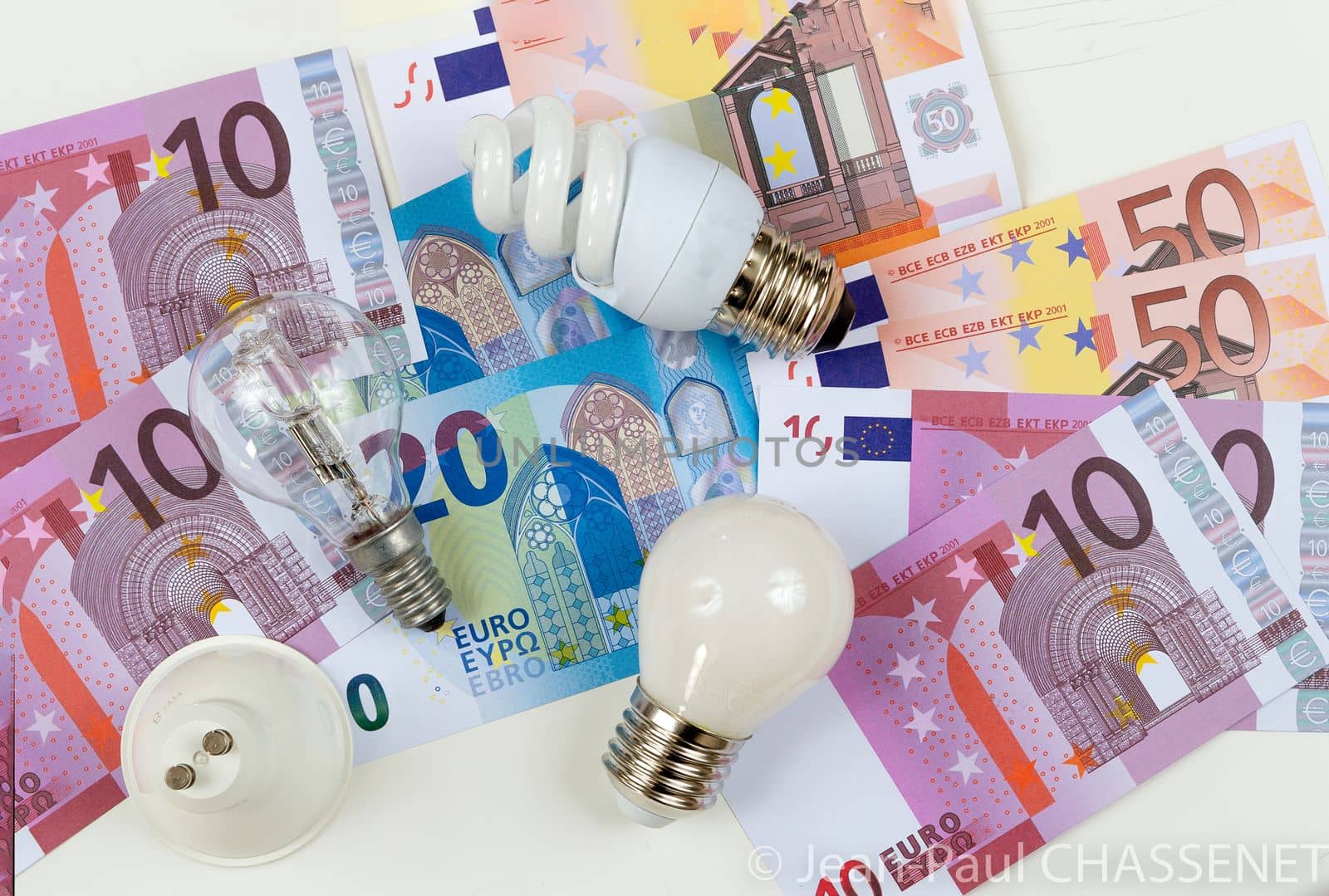 Energy costs and electricity prices. Electricity consumption concept. Euro Banknotes by JPC-PROD