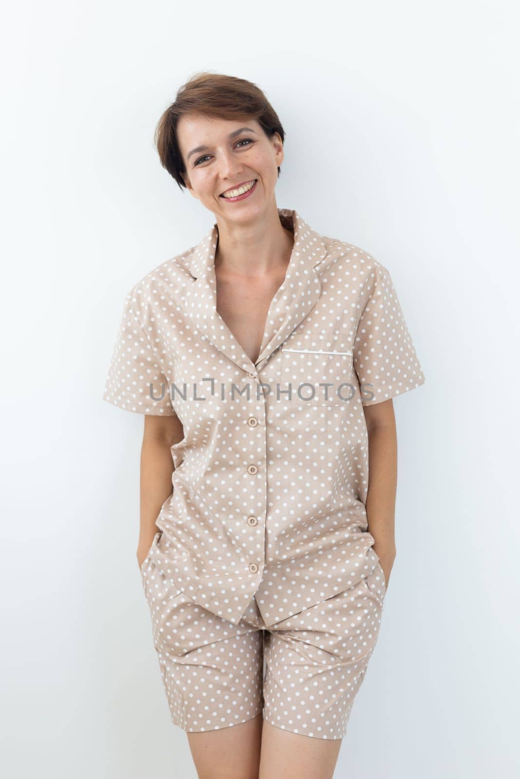 Woman wears pajama. Close-up detail and fabric texture of a pajama. Homewear, sleepwear, shopping and sale by Satura86