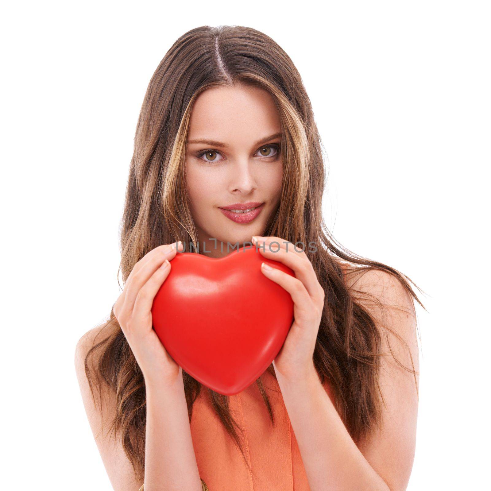 Face portrait, heart balloon and woman in studio isolated on white background. Love, affection and young female model holding symbol for romance, valentines passion or romantic emoji, care or empathy.