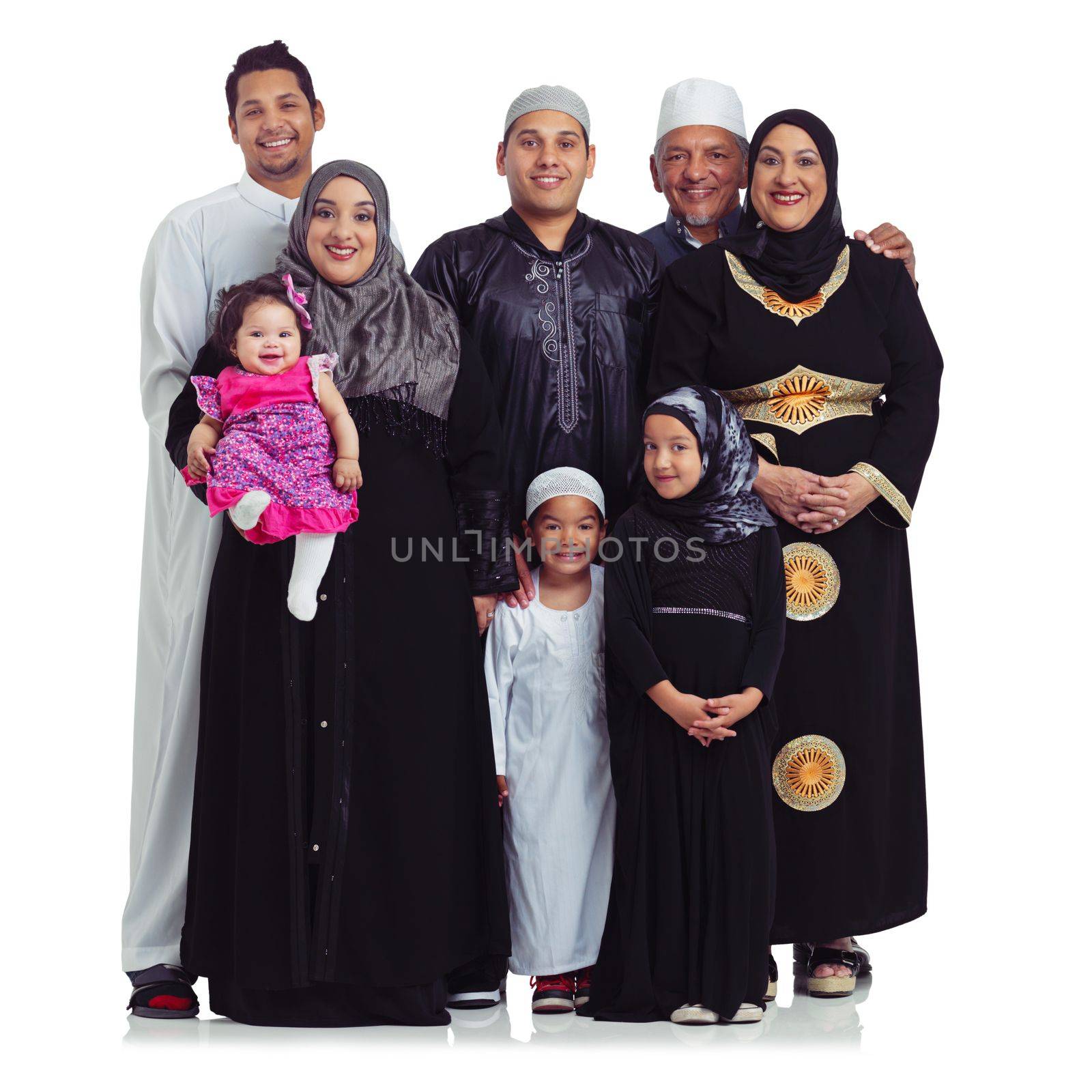 Family ties. Studio portrait of a multi generational muslim family isolated on white. by YuriArcurs