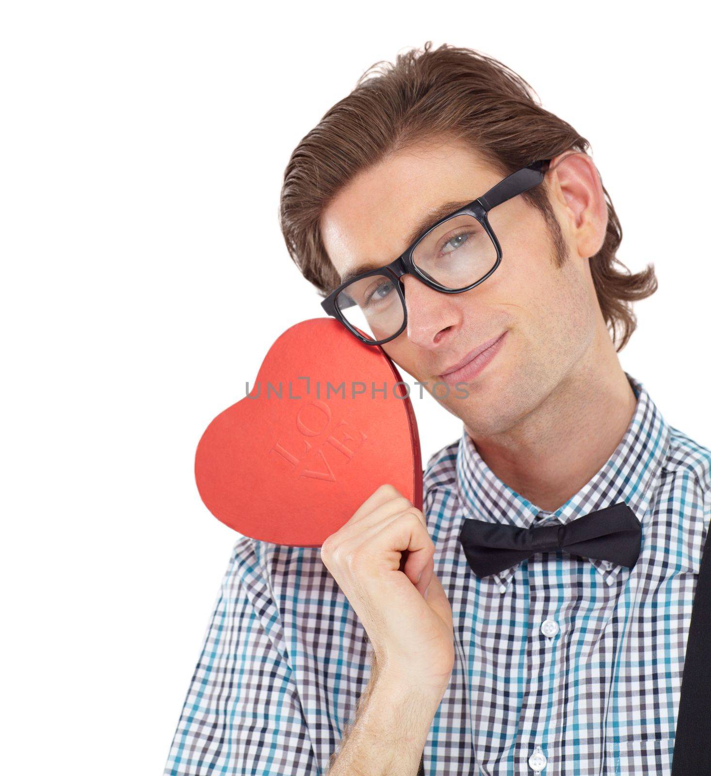 Love, nerd and portrait of man with heart emoji or icon for romance and valentines day isolated on white background. Smile, happy geek and valentine shape surprise with glasses and bow tie in studio